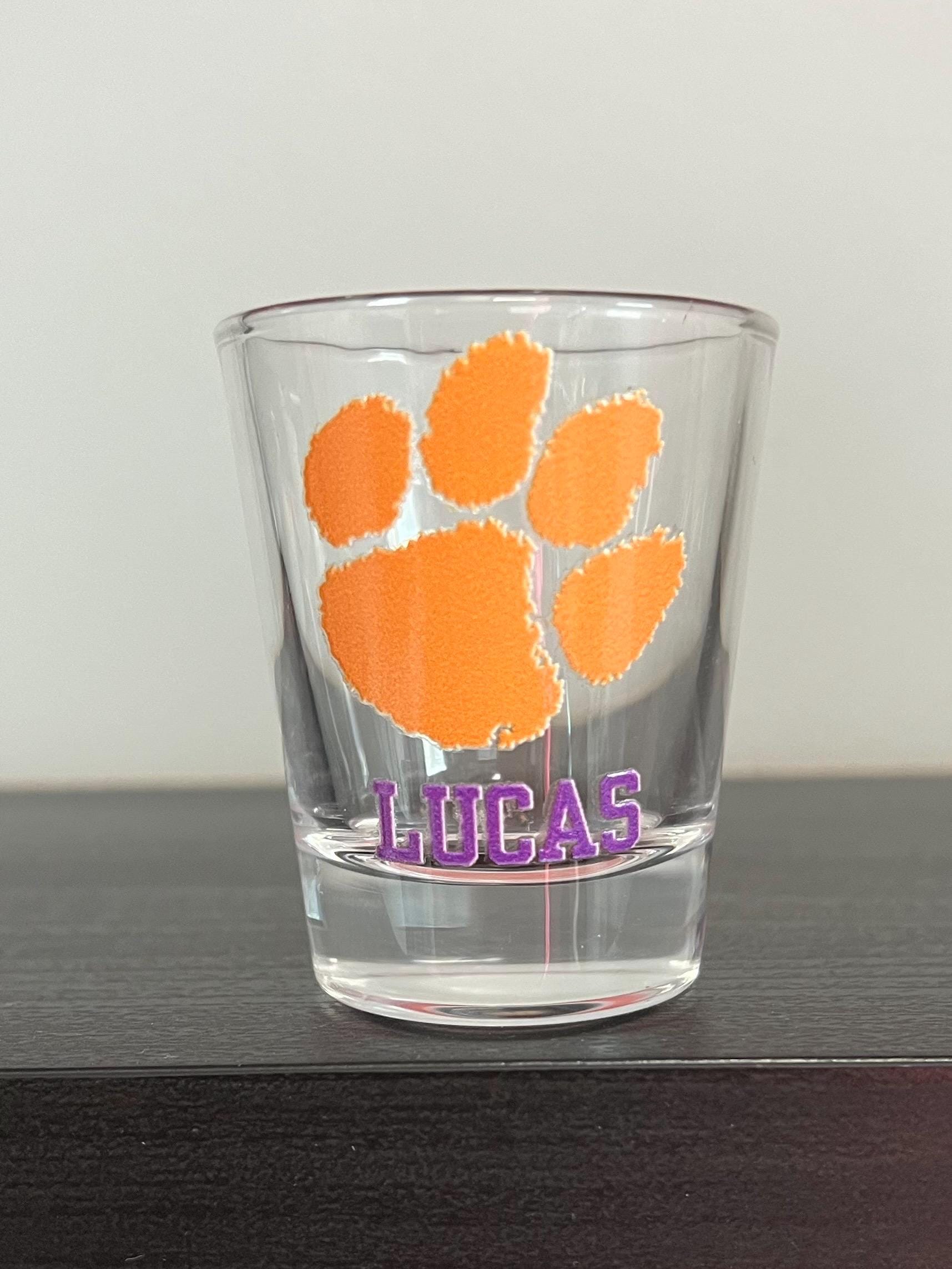 Personalized college shot glass. Custom shot glasses. Customized with college logo/mascot & name. College merch. All colleges available!