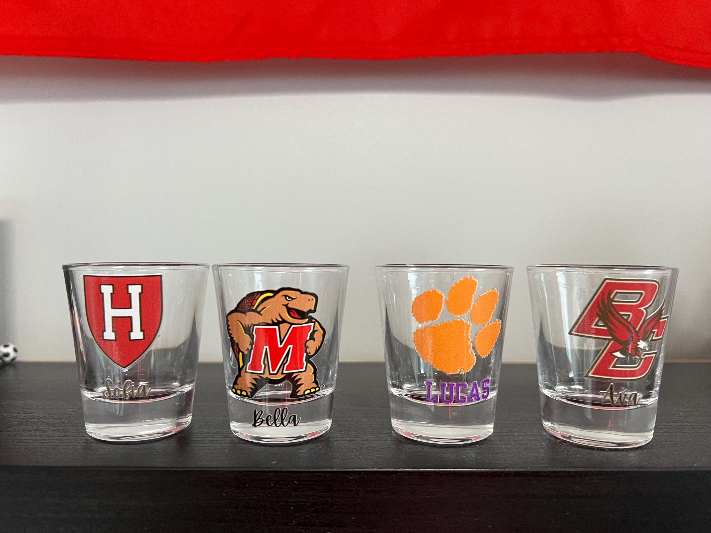 Personalized college shot glass. Custom shot glasses. Customized with college logo/mascot & name. College merch. All colleges available!