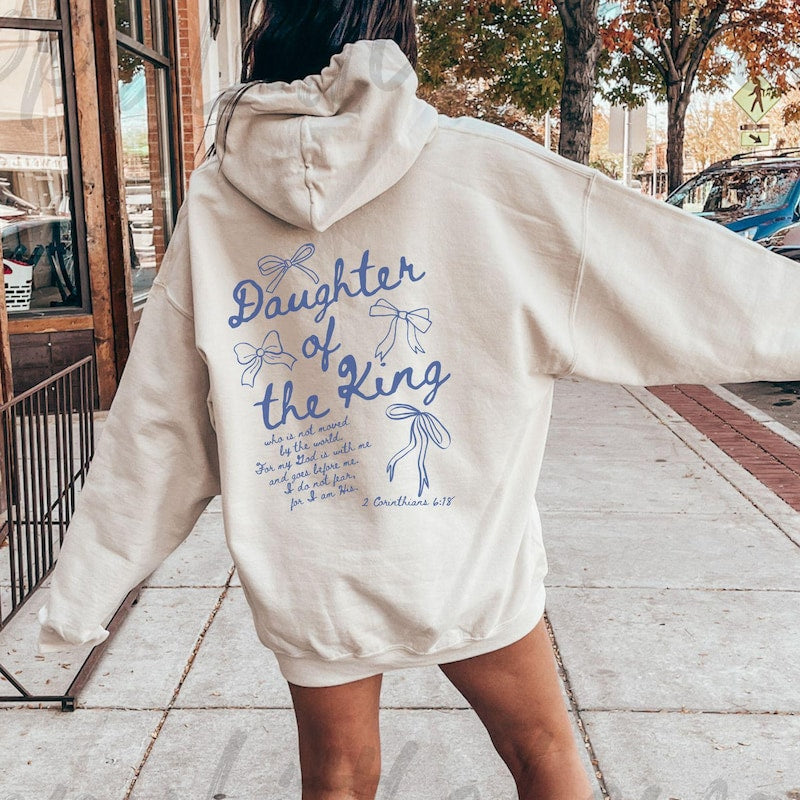 Trendy Christian Hoodie Daughter of the King Sweater Bible Verse Hoodie Aesthetic Women's Faith Apparel Words on Back Teenage Girl Gift