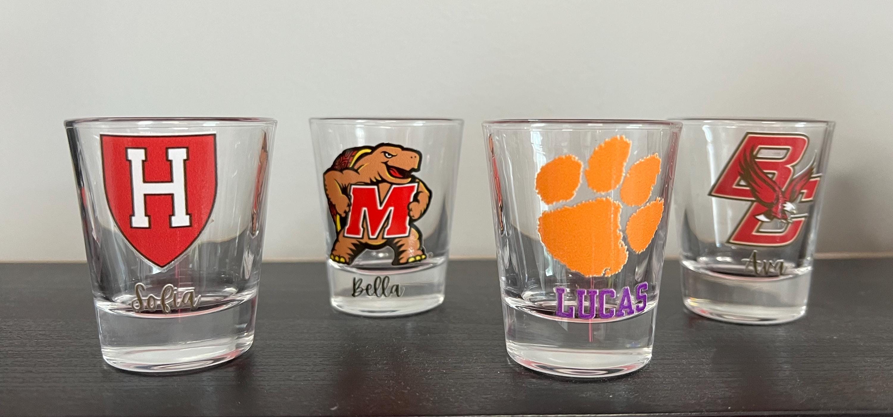 Personalized college shot glass. Custom shot glasses. Customized with college logo/mascot & name. College merch. All colleges available!